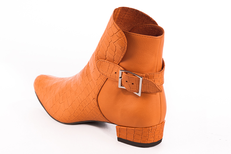 Apricot orange women's ankle boots with buckles at the back. Round toe. Low block heels. Rear view - Florence KOOIJMAN